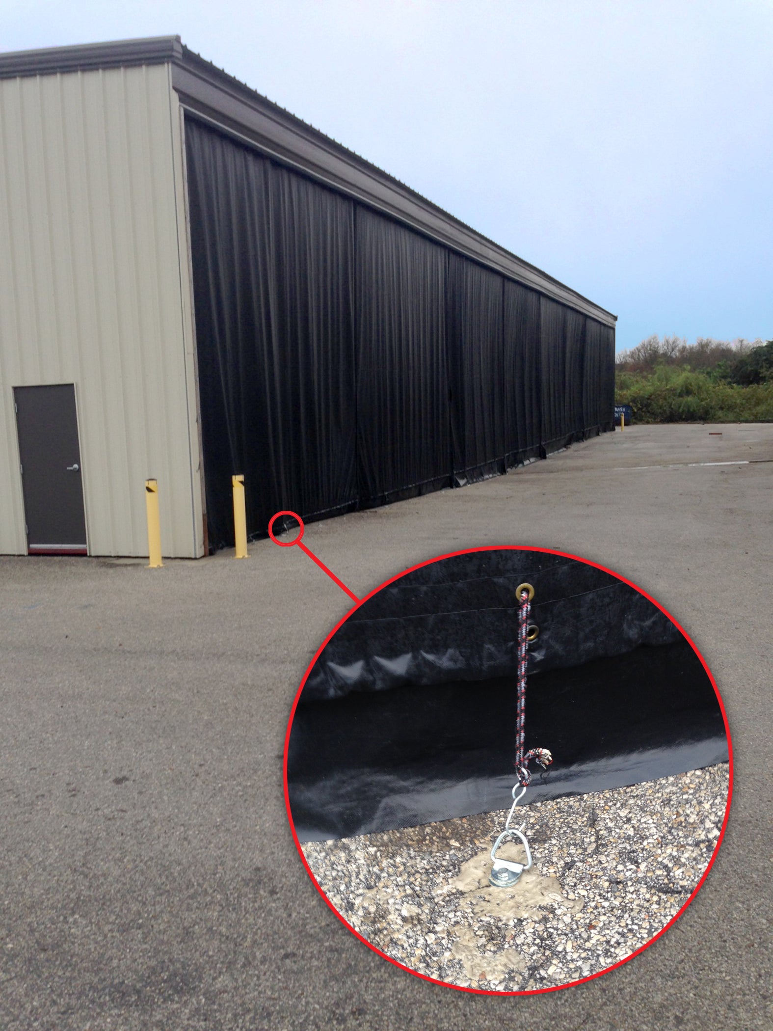 Commercial installation with asphalt anchors