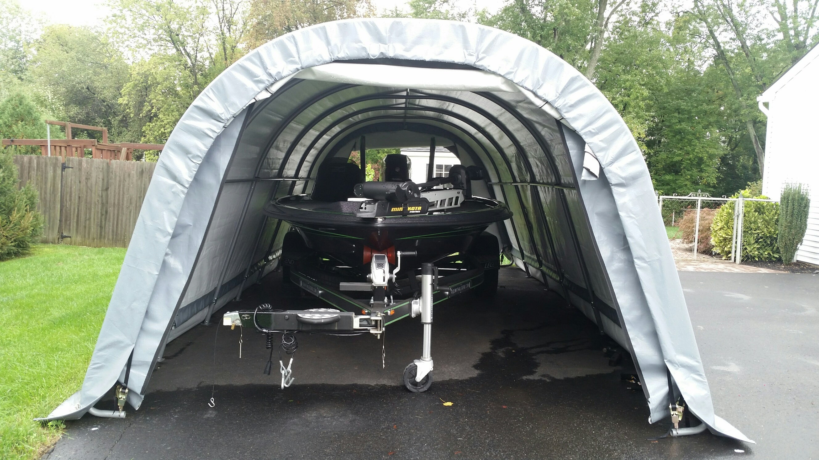 Boat cover installation with asphalt anchors
